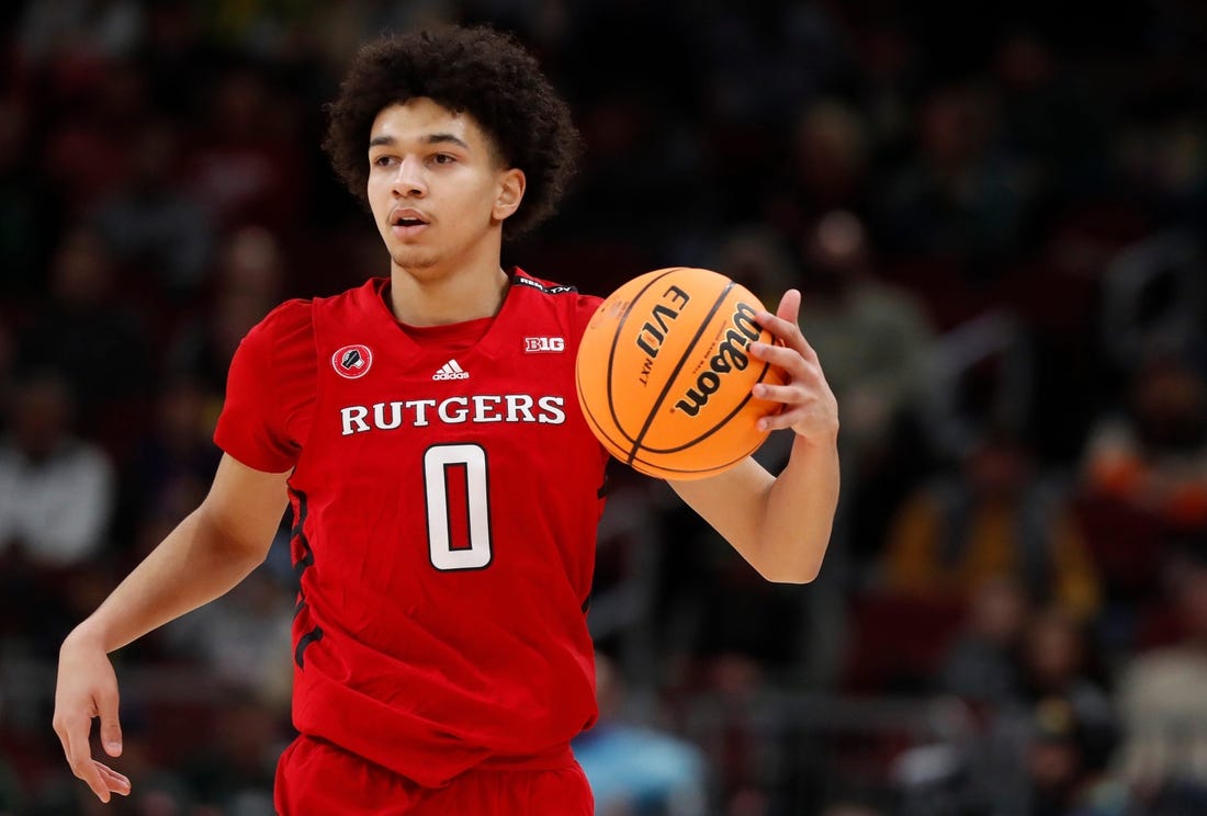 Rutgers Scarlet Knights guard Derek Simpson (0) drives to the basket during the Big Ten Men   s Basketball Tournament game against the Purdue Boilermakers, Friday, March 10, 2023, at United Center in Chicago. Purdue Boilermakers won 70-65.

Purrut031023 Am14298