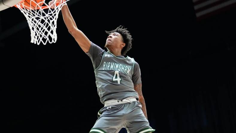 Mar 10, 2023; Frisco, TX, USA;  UAB Blazers guard Eric Gaines (4) dunks the ball against the North Texas Mean Green during the first half at Ford Center at The Star. Mandatory Credit: Chris Jones-USA TODAY Sports