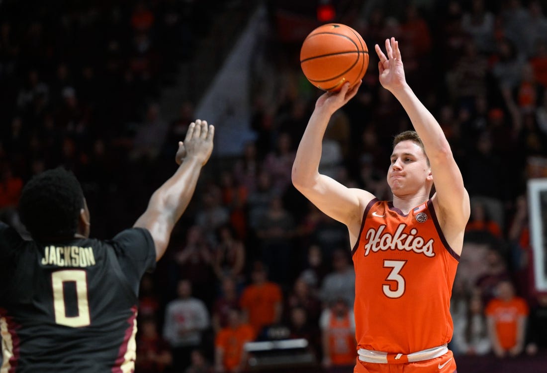 Mar 4, 2023; Blacksburg, Virginia, USA; Virginia Tech Hokies guard Sean Pedulla (3) shoots over Florida State Seminoles guard Chandler Jackson (0) at Cassell Coliseum. Mandatory Credit: Lee Luther Jr.-USA TODAY Sports