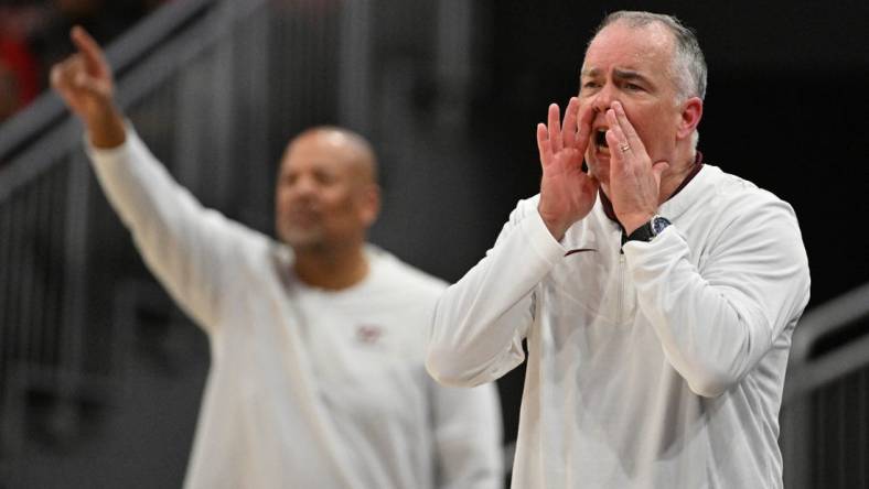 Feb 28, 2023; Louisville, Kentucky, USA;  Virginia Tech Hokies head coach Mike Young during the second half against the Louisville Cardinals at KFC Yum! Center. Virginia Tech defeated Louisville 71-54. Mandatory Credit: Jamie Rhodes-USA TODAY Sports