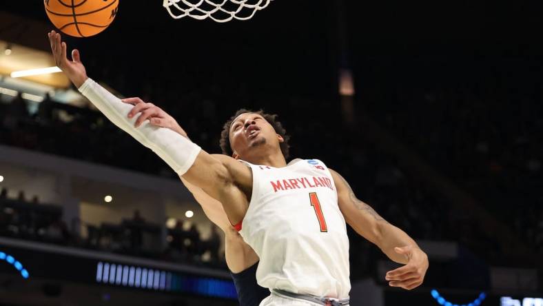 Mar 16, 2023; Birmingham, AL, USA; Maryland Terrapins guard Jahmir Young (1) reaches back for a rebound against the West Virginia Mountaineers during the first half in the first round of the 2023 NCAA Tournament at Legacy Arena. Mandatory Credit: Vasha Hunt-USA TODAY Sports