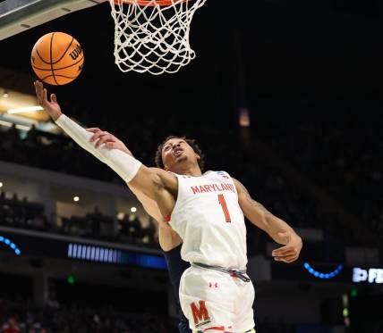 Mar 16, 2023; Birmingham, AL, USA; Maryland Terrapins guard Jahmir Young (1) reaches back for a rebound against the West Virginia Mountaineers during the first half in the first round of the 2023 NCAA Tournament at Legacy Arena. Mandatory Credit: Vasha Hunt-USA TODAY Sports