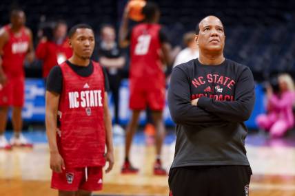 Mar 16, 2023; Denver, CO, USA; North Carolina State Wolfpack head coach Kevin Keatts watches practice before the first round of the NCAA Tournament at Ball Arena. Mandatory Credit: Michael Ciaglo-USA TODAY Sports