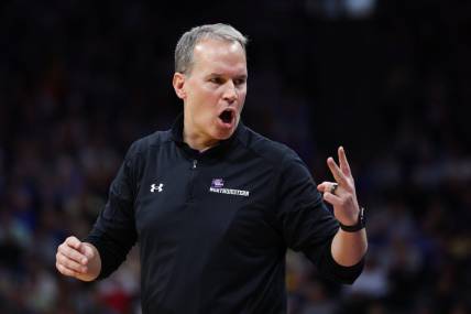 Mar 18, 2023; Sacramento, CA, USA; Northwestern Wildcats head coach Chris Collins gives directions during the first half against the UCLA Bruins at Golden 1 Center. Mandatory Credit: Kelley L Cox-USA TODAY Sports