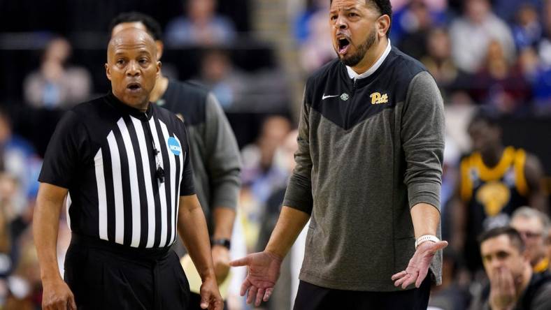 Pittsburgh Panthers head coach Jeff Capel III argues with an official in the second half of a second-round college basketball game between the Pittsburgh Panthers and the Xavier Musketeers in the NCAA Tournament, Sunday, March 19, 2023, at Greensboro Coliseum in Greensboro, N.C. The Xavier Musketeers won, 84.73.

Ncaa Xavier Pitt Basketball March 19 0502