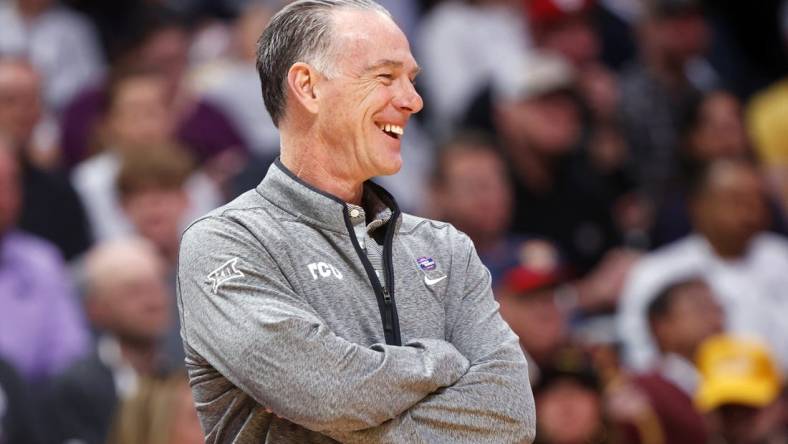 Mar 19, 2023; Denver, CO, USA; TCU Horned Frogs head coach Jamie Dixon smiles in the first half against the Gonzaga Bulldogs at Ball Arena. Mandatory Credit: Michael Ciaglo-USA TODAY Sports