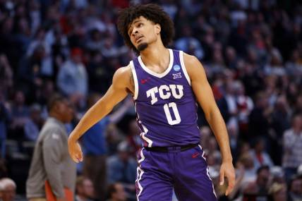 Mar 19, 2023; Denver, CO, USA; TCU Horned Frogs guard Micah Peavy (0) reacts in the second half against the Gonzaga Bulldogs at Ball Arena. Mandatory Credit: Michael Ciaglo-USA TODAY Sports