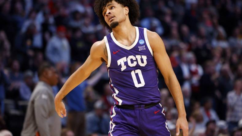 Mar 19, 2023; Denver, CO, USA; TCU Horned Frogs guard Micah Peavy (0) reacts in the second half against the Gonzaga Bulldogs at Ball Arena. Mandatory Credit: Michael Ciaglo-USA TODAY Sports