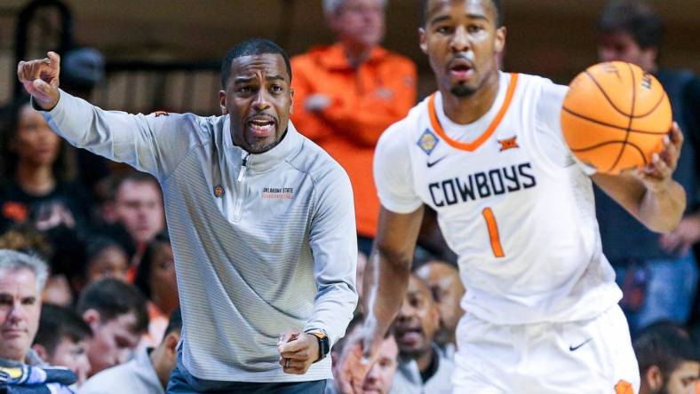 Oklahoma State head coach Mike Boynton Jr. yells to players in the first half during a college basketball game in the quarterfinals of the National Invitational Tournament between the Oklahoma State Cowboys (OSU) and the North Texas Mean Green at Gallagher-Iba Arena in Stillwater, Okla., Tuesday, March 21, 2023.

Osu Vs Nt