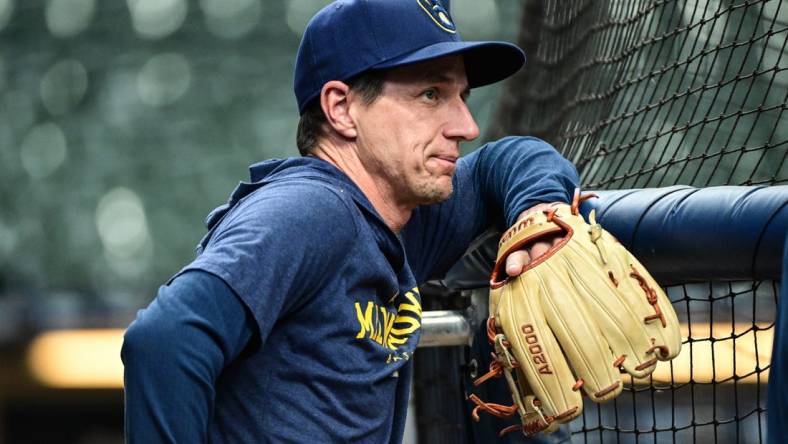 Apr 3, 2023; Milwaukee, Wisconsin, USA; Milwaukee Brewers manager Craig Counsell watches batting practice before game against the New York Mets at American Family Field. Mandatory Credit: Benny Sieu-USA TODAY Sports