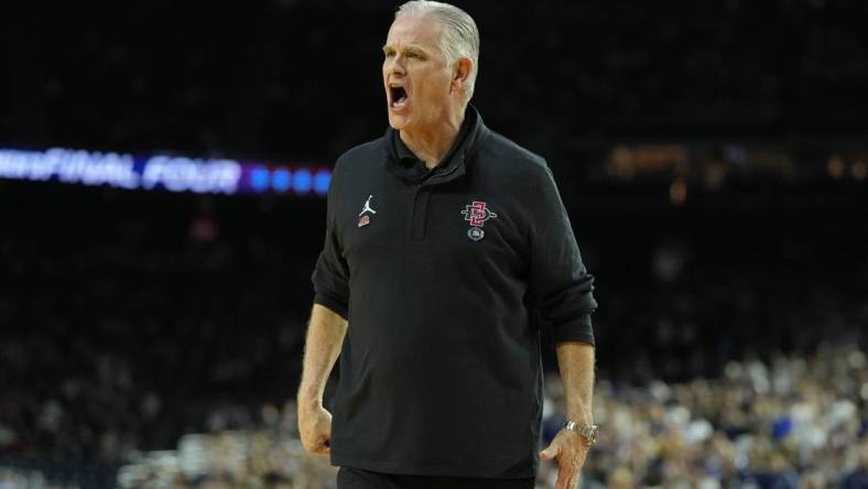 Apr 3, 2023; Houston, TX, USA; San Diego State Aztecs head coach Brian Dutcher reacts after a play against the Connecticut Huskies during the first half in the national championship game of the 2023 NCAA Tournament at NRG Stadium. Mandatory Credit: Bob Donnan-USA TODAY Sports