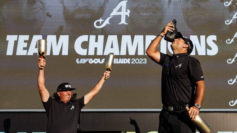 Apr 23, 2023; Adelaide, South Australia, AUS; Team Aces (Pat Perez, Dustin Johnson, Peter Uihlein) celebrate their victory in the team competition, following the final round of LIV Golf Adelaide golf tournament at Grange Golf Club. Mandatory Credit: Mike Frey-USA TODAY Sports