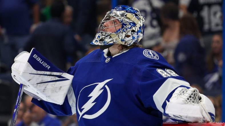 Apr 29, 2023; Tampa, Florida, USA; Tampa Bay Lightning goaltender Andrei Vasilevskiy (88) reacts after losing to the Toronto Maple Leafs in overtime during game six of the first round of the 2023 Stanley Cup Playoffs at Amalie Arena. Mandatory Credit: Nathan Ray Seebeck-USA TODAY Sports