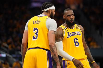 May 2, 2023; San Francisco, California, USA; Los Angeles Lakers forward LeBron James (6) talks with forward Anthony Davis (3) during a break in the action against the Golden State Warriors in the fourth quarter during game one of the 2023 NBA playoffs at the Chase Center. Mandatory Credit: Cary Edmondson-USA TODAY Sports