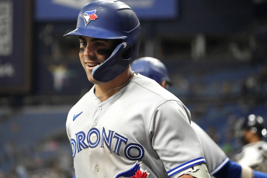 May 22, 2023; St. Petersburg, Florida, USA; Toronto Blue Jays left fielder Whit Merrifield (15) reacts after hitting a home run against the Tampa Bay Rays during the fourth inning at Tropicana Field. Mandatory Credit: Dave Nelson-USA TODAY Sports