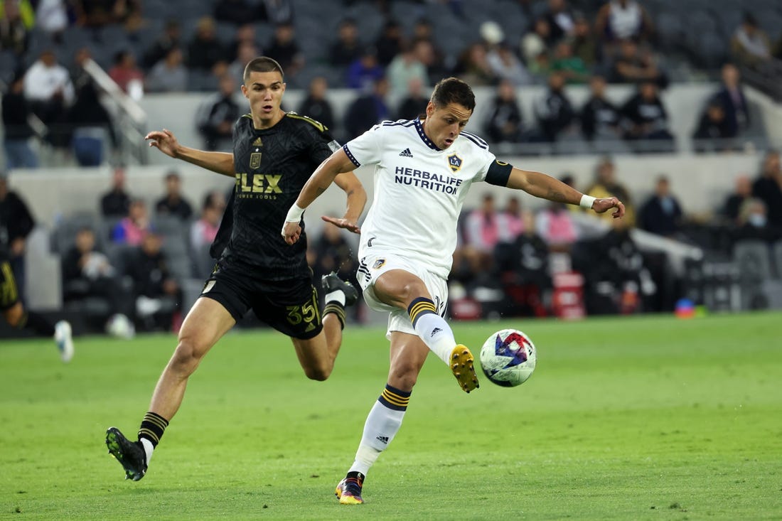 May 23, 2023; Los Angeles, CA, USA; Los Angeles Galaxy forward Javier Hernandez (14) controls the ball during the first half against the Los Angeles FC at BMO Stadium. Mandatory Credit: Kiyoshi Mio-USA TODAY Sports