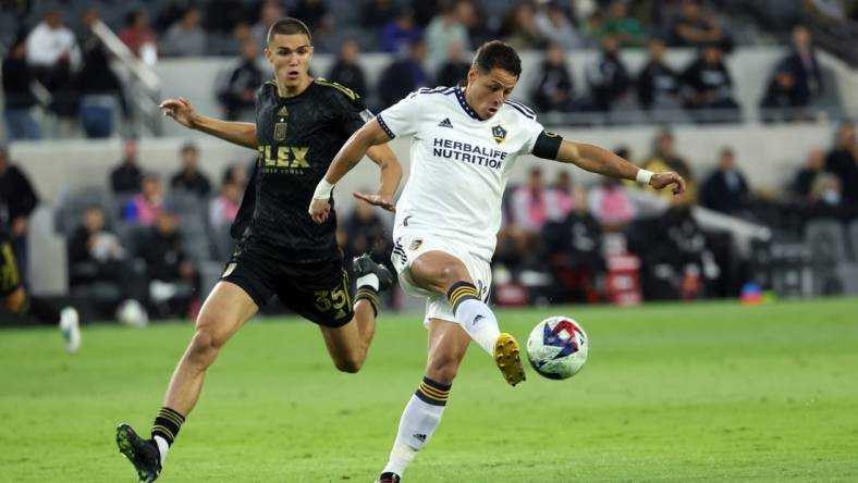 May 23, 2023; Los Angeles, CA, USA; Los Angeles Galaxy forward Javier Hernandez (14) controls the ball during the first half against the Los Angeles FC at BMO Stadium. Mandatory Credit: Kiyoshi Mio-USA TODAY Sports