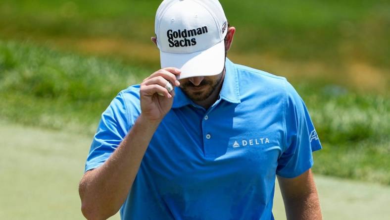 June 3, 2023; Dublin, Ohio, USA;  Patrick Cantlay reacts to a birdie putt on the fourth hole during the third round of the Memorial Tournament at Muirfield Village Golf Club.