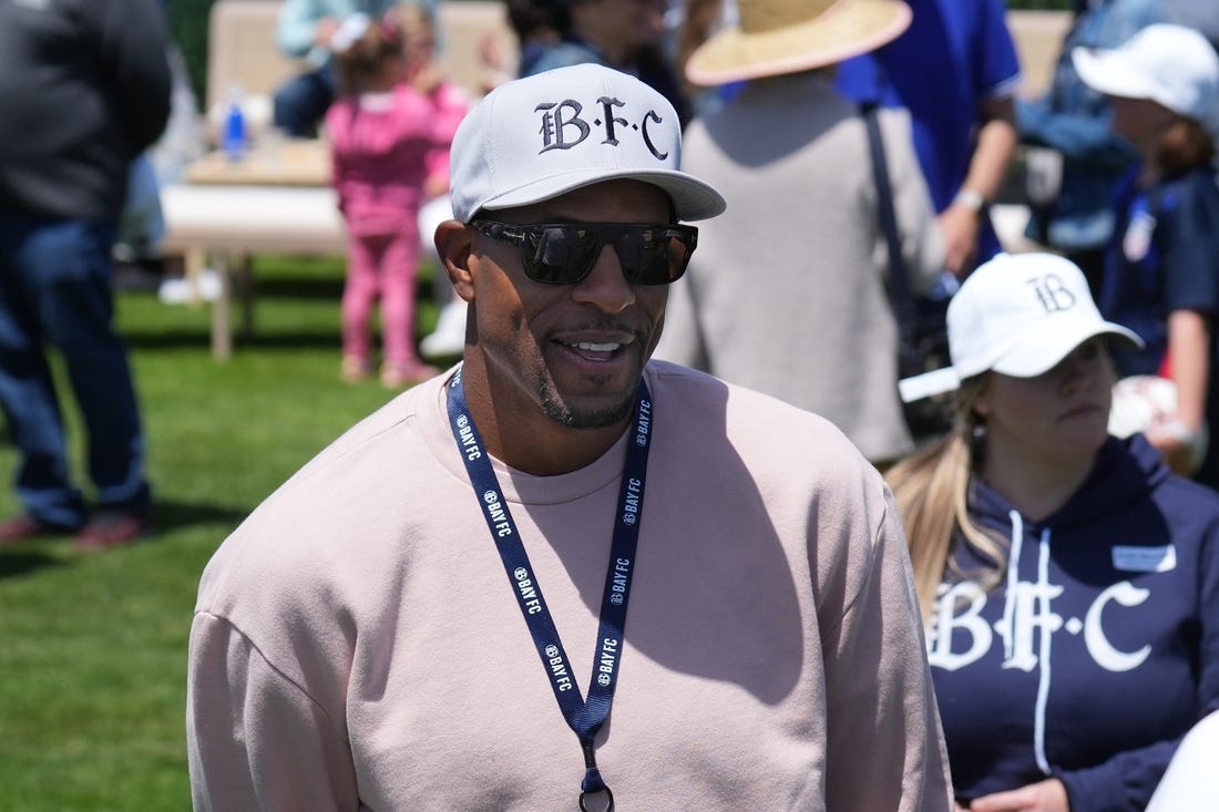 Jun 3, 2023; San Francisco, California, USA; Golden State Warriors former player Andre Iguodala talks to fans during the Bay FC Day for the Bay event at Presidio Main Post Lawn. Mandatory Credit: Darren Yamashita-USA TODAY Sports