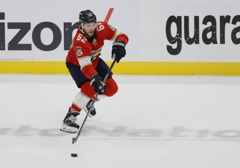June 10, 2023; Sunrise, FL, USA; Florida Panthers defenseman Brandon Montour (62) controls the puck against the Vegas Golden Knights in the first period in game four of the 2023 Stanley Cup Final at FLA Live Arena. Mandatory Credit: Sam Navarro-USA TODAY Sports