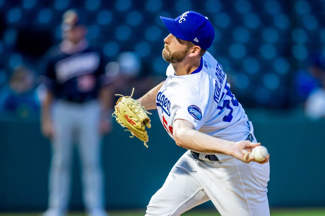 Oklahoma City Dodgers pitcher Adam Kolarek (56) pitches during a Minor League Baseball game between the Oklahoma City Dodgers and the Las Vegas Aviators at Chickasaw Bricktown Ballpark in Oklahoma City on Wednesday, June 21, 2023.