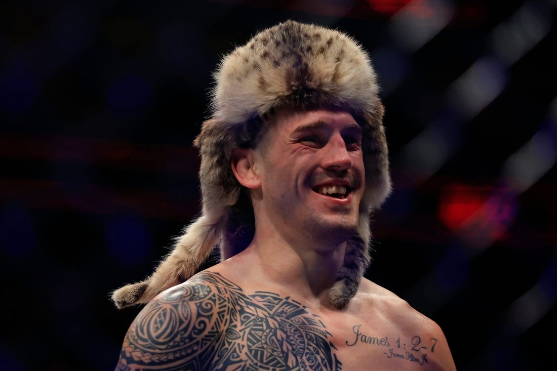 Brendan Allen smiles after winning a middleweight bout during the UFC Fight Night event Saturday, June 24, 2023 at VyStar Veterans Memorial Arena in Jacksonville, Fla. Brendan Allen defeated Bruno Silva by way of submission in the first round.