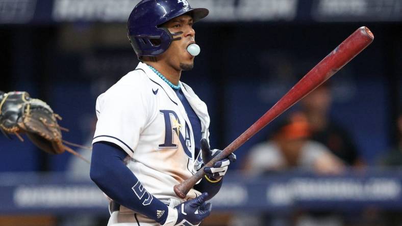 Jul 20, 2023; St. Petersburg, Florida, USA;  Tampa Bay Rays shortstop Wander Franco (5) reacts after striking out against the Baltimore Orioles in the ninth inning at Tropicana Field. Mandatory Credit: Nathan Ray Seebeck-USA TODAY Sports