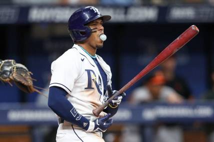 Jul 20, 2023; St. Petersburg, Florida, USA;  Tampa Bay Rays shortstop Wander Franco (5) reacts after striking out against the Baltimore Orioles in the ninth inning at Tropicana Field. Mandatory Credit: Nathan Ray Seebeck-USA TODAY Sports