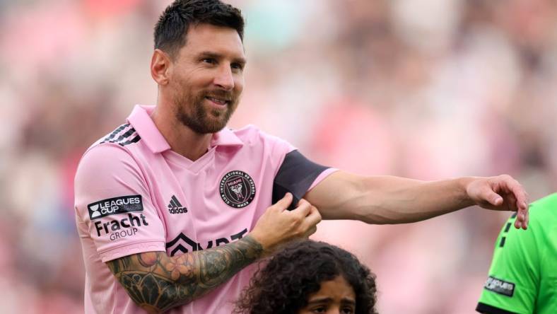 Jul 25, 2023; Fort Lauderdale, FL, USA;  Inter Miami CF forward Lionel Messi (10) smiles as the teams stand for the national anthem before the game against the Atlanta United at DRV PNK Stadium. Mandatory Credit: Sam Navarro-USA TODAY Sports