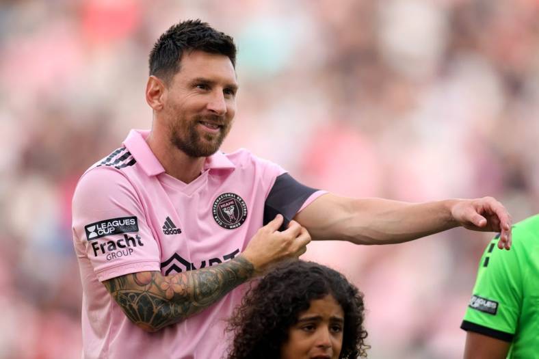 Jul 25, 2023; Fort Lauderdale, FL, USA;  Inter Miami CF forward Lionel Messi (10) smiles as the teams stand for the national anthem before the game against the Atlanta United at DRV PNK Stadium. Mandatory Credit: Sam Navarro-USA TODAY Sports