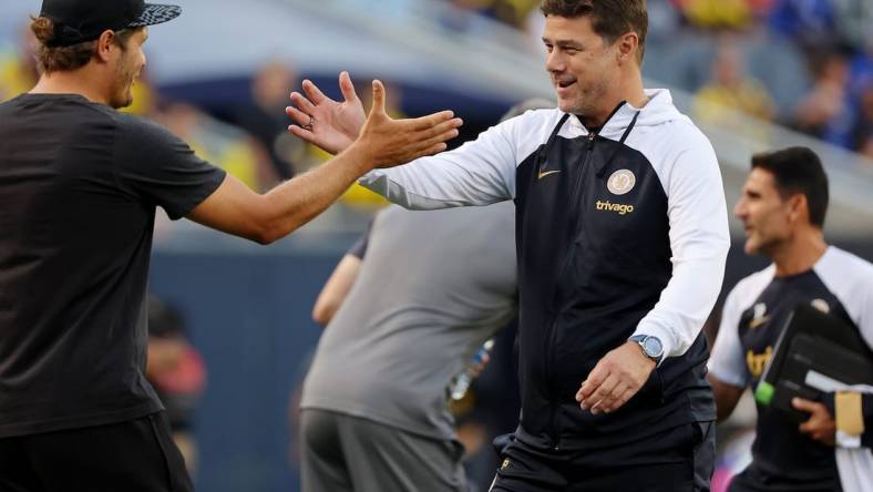 Aug 2, 2023; Chicago, Illinois, USA; Borussia Dortmund manager Edin Terzic (left) shakes hands with Chelsea manager Mauricio Pochettino (right) before the game at Soldier Field. Mandatory Credit: Jon Durr-USA TODAY Sports