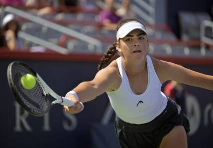 Aug 5, 2023; Montreal, Quebec, Canada; Marina Stakusic (CAN) hits a forehand against Alycia Parks (USA) (not pictured) in first round qualifying play at IGA Stadium. Mandatory Credit: Eric Bolte-USA TODAY Sports