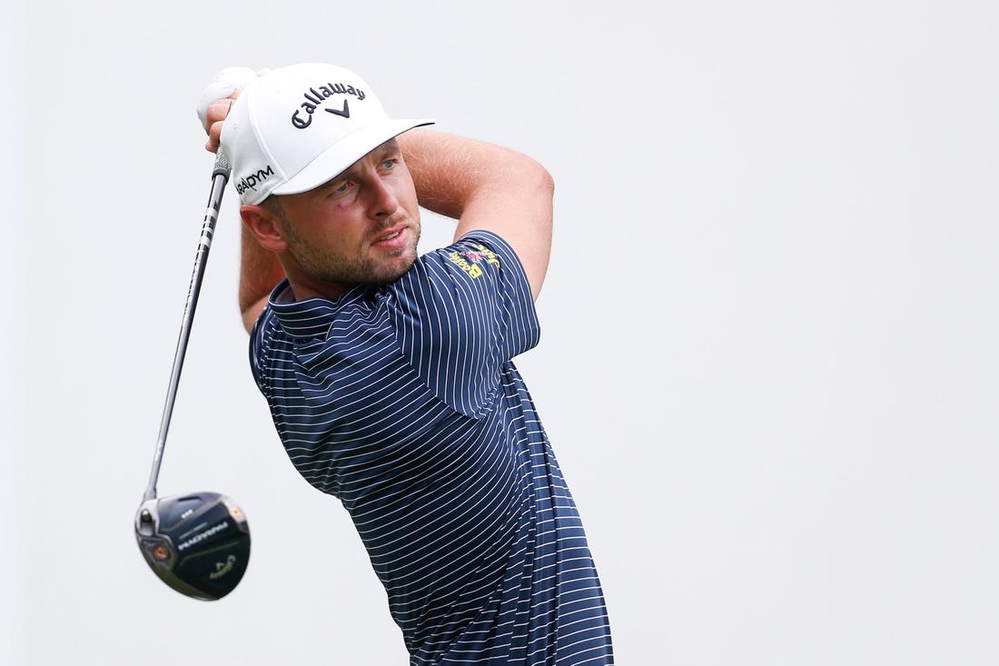 PGA Tour player Adam Svensson tees off at the first hole during the third round of the FedEx St. Jude Championship at TPC Southwind in Memphis, Tenn., on Saturday, August 12, 2023.