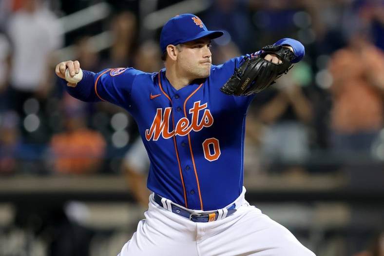 Aug 14, 2023; New York City, New York, USA; New York Mets relief pitcher Adam Ottavino (0) pitches against the Pittsburgh Pirates during the ninth inning at Citi Field. Mandatory Credit: Brad Penner-USA TODAY Sports