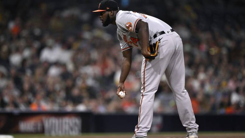 Aug 14, 2023; San Diego, California, USA; Baltimore Orioles relief pitcher Felix Bautista (74) prepares to pitch against the San Diego Padres during the ninth inning at Petco Park. Mandatory Credit: Orlando Ramirez-USA TODAY Sports