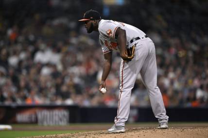 Aug 14, 2023; San Diego, California, USA; Baltimore Orioles relief pitcher Felix Bautista (74) prepares to pitch against the San Diego Padres during the ninth inning at Petco Park. Mandatory Credit: Orlando Ramirez-USA TODAY Sports