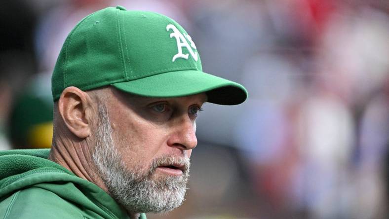 Aug 15, 2023; St. Louis, Missouri, USA;  Oakland Athletics manager Mark Kotsay (7) looks on from the dugout before a game against the St. Louis Cardinals at Busch Stadium. Mandatory Credit: Jeff Curry-USA TODAY Sports