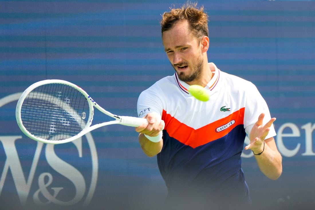 Daniil Medvedev, of Russia, hits a forehand to Lorenzo Musetti, of Italy, during the Western & Southern Open at the Lindner Family Tennis Center in Mason on Wednesday, Aug. 16, 2023. Medvedev won 6-3, 6-2.