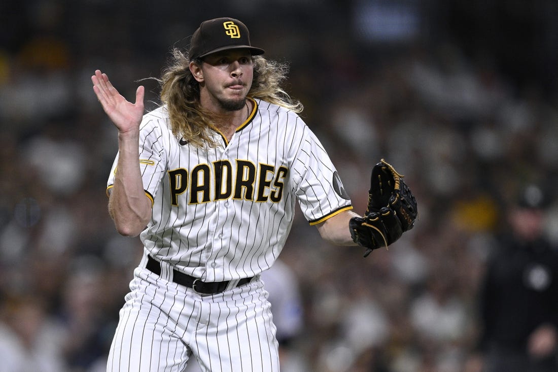 Aug 22, 2023; San Diego, California, USA; San Diego Padres relief pitcher Scott Barlow (58) reacts during the seventh inning against the Miami Marlins at Petco Park. Mandatory Credit: Orlando Ramirez-USA TODAY Sports