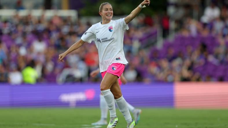 Aug 25, 2023; Orlando, Florida, USA; San Diego Wave FC defender Abby Dahlkemper (2) celebrates after scoring a goal during the first half against the Orlando Pride at Exploria Stadium. Mandatory Credit: Nathan Ray Seebeck-USA TODAY Sports