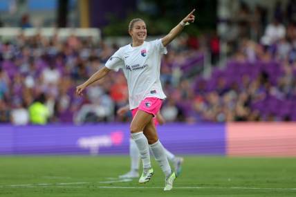 Aug 25, 2023; Orlando, Florida, USA; San Diego Wave FC defender Abby Dahlkemper (2) celebrates after scoring a goal during the first half against the Orlando Pride at Exploria Stadium. Mandatory Credit: Nathan Ray Seebeck-USA TODAY Sports