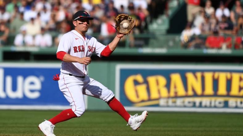 Aug 26, 2023; Boston, Massachusetts, USA;  Boston Red Sox second baseman Luis Urias (17) fields a ball during the first inning against the Los Angeles Dodgers at Fenway Park. Mandatory Credit: Bob DeChiara-USA TODAY Sports