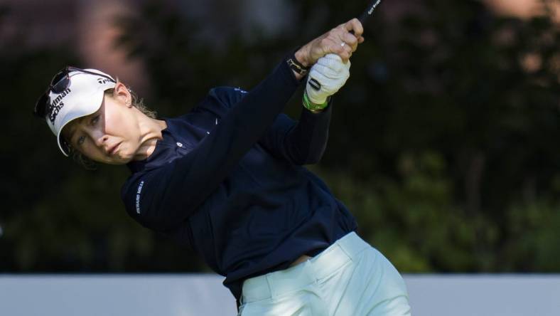 Aug 26, 2023; Vancouver, British Columbia, CAN; Nelly Korda tees off on the fourth hole during the third round of the CPKC Women's Open golf tournament at Shaughnessy Golf & Country Club. Mandatory Credit: Bob Frid-USA TODAY Sports