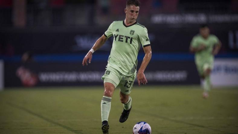 Aug 26, 2023; Frisco, Texas, USA; Austin FC midfielder Ethan Finlay (13) in action during the game between FC Dallas and Austin FC at Toyota Stadium. Mandatory Credit: Jerome Miron-USA TODAY Sports