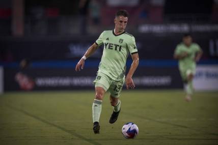 Aug 26, 2023; Frisco, Texas, USA; Austin FC midfielder Ethan Finlay (13) in action during the game between FC Dallas and Austin FC at Toyota Stadium. Mandatory Credit: Jerome Miron-USA TODAY Sports