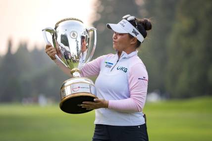 Aug 27, 2023; Vancouver, British Columbia, CAN; Megan Khang holds the championship trophy after the final round of the CPKC Women's Open golf tournament at Shaughnessy Golf & Country Club. Mandatory Credit: Bob Frid-USA TODAY Sports