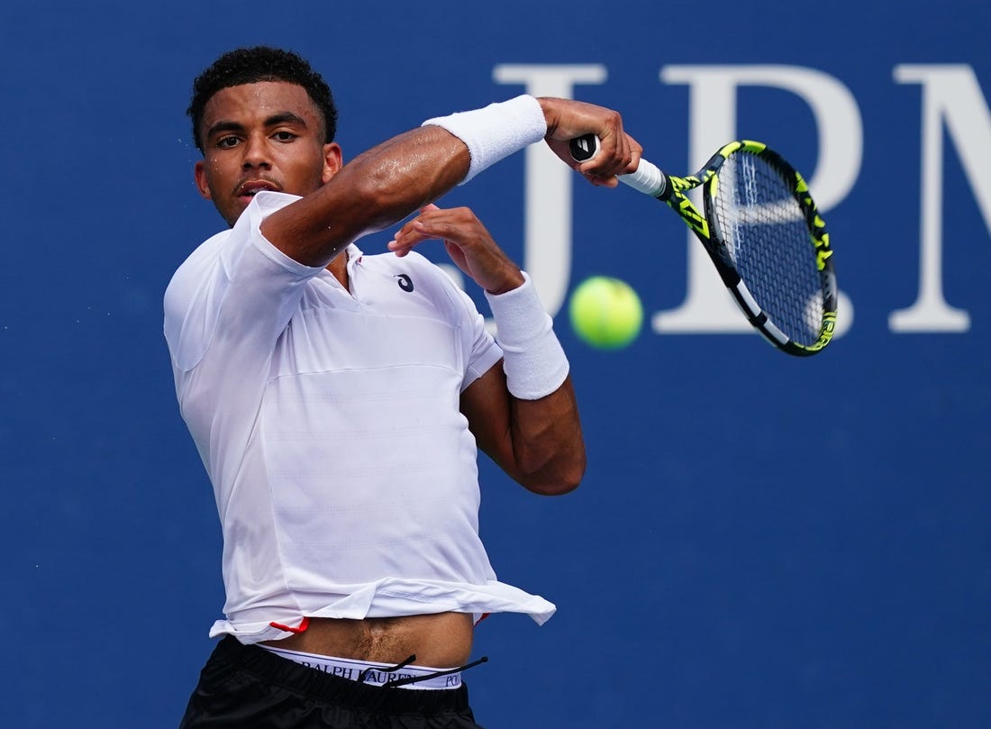 Aug 29, 2023; Flushing, NY, USA;  Arthur Fils of France hits a shot against Tallon Griekspoor of Netherlands on day two of the 2023 U.S. Open tennis tournament at the USTA Billie Jean King National Tennis Center. Mandatory Credit: Jerry Lai-USA TODAY Sports