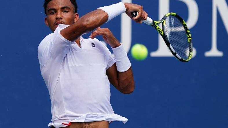 Aug 29, 2023; Flushing, NY, USA;  Arthur Fils of France hits a shot against Tallon Griekspoor of Netherlands on day two of the 2023 U.S. Open tennis tournament at the USTA Billie Jean King National Tennis Center. Mandatory Credit: Jerry Lai-USA TODAY Sports