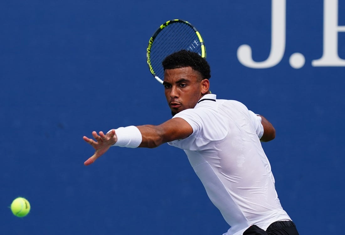 Aug 29, 2023; Flushing, NY, USA;  Arthur Fils of France hits a shot against Tallon Griekspoor of Netherlands on day two of the 2023 U.S. Open tennis tournament at the USTA Billie Jean King National Tennis Center. Mandatory Credit: Jerry Lai-USA TODAY Sports