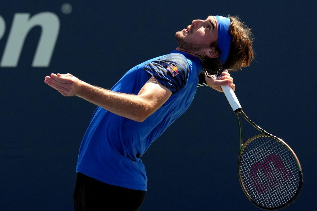 Aug 30, 2023; Flushing, NY, USA; Stefanos Tsitsipas of Greece serves to Dominic Stricker of Switzerland on day three of the 2023 U.S. Open tennis tournament at USTA Billie Jean King National Tennis Center. Mandatory Credit: Danielle Parhizkaran-USA TODAY Sports